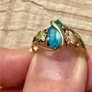 Gold Ring with Blue Gemstone